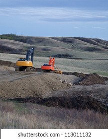 WILLISTON, NORTH DAKOTA - MAY 3:  Bulldozers break more ground near Williston, ND, May 3, 2010.  Oil discoveries have led to massive development and job creation according to a news source