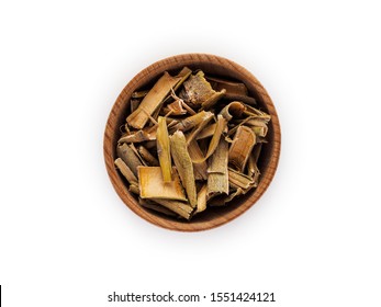 Willow Bark In Wooden Cup On White Background.