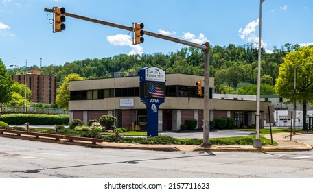 Wilmerding, Pennsylvania, USA May 14, 2022 The United Community Federal Credit Union On Airbrake Avenue On A Sunny Spring Day