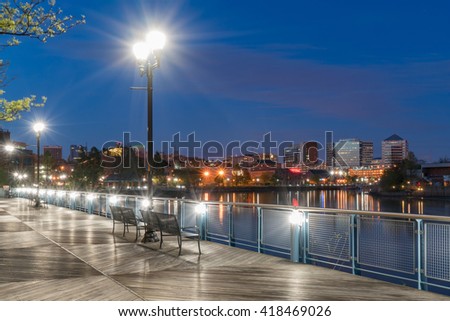 Wilmington Delaware skyline along the Riverfront at night along the Christiana River