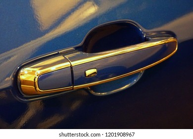 Wilmington, Delaware, U.S.A - The Car Door Handle Of Chevy Volt All Electric In Blue Color Vehicle