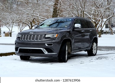 Wilmington, Delaware, U.S.A - January 13, 2019 - Jeep Grand Cherokee 2016 SUV on a snowy road