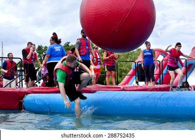 Wilmington, Delaware, USA - June 13, 2015: Friends Running At The 