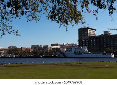 Wilmington NC, USA, March 13, 2018
City Scape From Battleship Park Including US Coast Guard Cutter