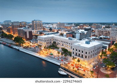 Wilmington, North Carolina, USA aerial cityscape at dusk.