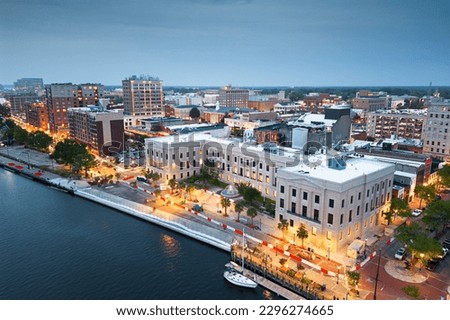 Wilmington, North Carolina, USA aerial cityscape at dusk.