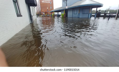 Wilmington, North Carolina - USA / September 15, 2018. The Cape Fear River Floods Downtown Water St. Repeatedly, During Hurricane Florence. Pictured, Visitors Center And 18 South Water St