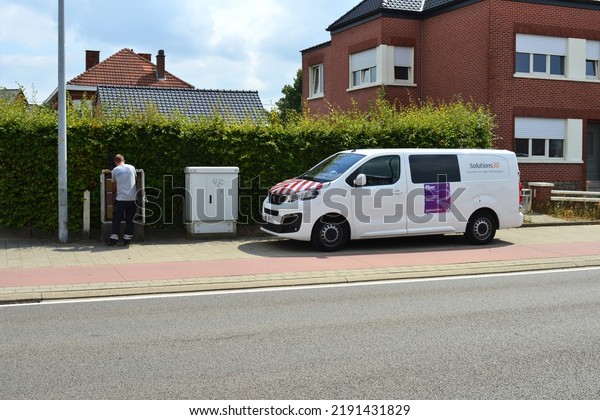 Wilsele, Vlaams-Brabant, Belgium - August\
18, 2022: Proximus Belgian telecom operator checking the telephone\
copper lines in the cable distributor\
box