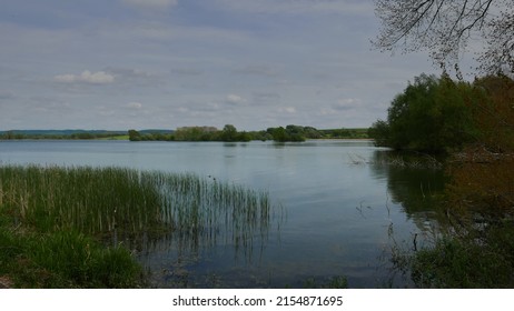 Wilstone Reservoir, near Tring, in Hertfordshire, England, on a calm day in May.