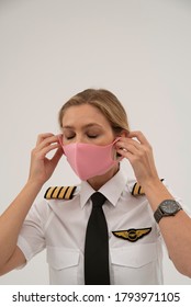 Wiltshire, England, UK. August 2020.  Airline Pilot Wearing A Face Mask During The Covid-19 Lockdown.