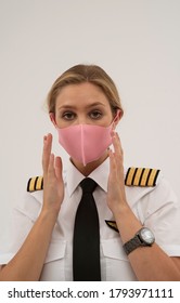 Wiltshire, England, UK. August 2020.  Airline Pilot Wearing A Face Mask During The Covid-19 Lockdown.