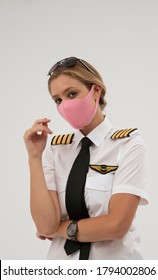 Wiltshire, England, UK. August 2020.  Airline Pilot Wearing A Face Mask During The Covid-19 Lockdown.