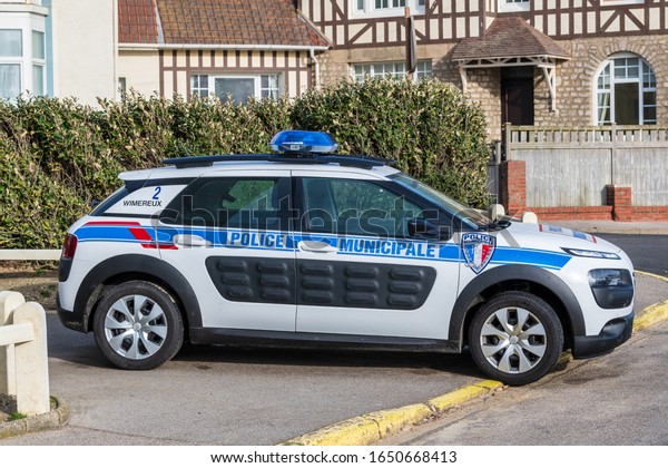Wimereux, France - February 12,\
2020 :  Car police french city vehicle in a Wimereux\'street,\
France.