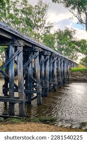The Wimmera Highway crosses the Wimmera River at Quanton  This old railway bridge runs alongside the road  It is an all wooden construction  abandoned when the railway was upgraded 