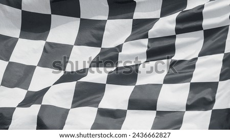 win winner checkered flag Black and white waving on  on post sign of final round end of line racing motor sport competition game. checkered flag 