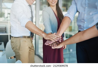 To Win, Youve Gotta Go All In. Shot Of A Group Of Colleagues Joining Their Hands Together In Solidarity.