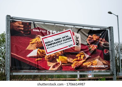 Wincanton, South Somerset / United Kingdom - April 17 2020: A Large Billboard Style Sign Outside KFC Informing Public It's Closed Due To COVID-19 Outbreak And UK Lockdown