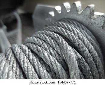 Winch With A Metal Cable. Coiled Metal Cable. Carelessly Twisted Metal Cable