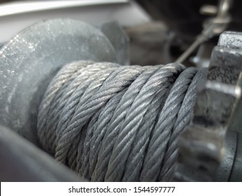 Winch With A Metal Cable. Coiled Metal Cable. Carelessly Twisted Metal Cable