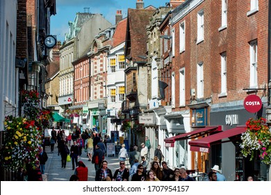 Winchester, Hampshire / United Kingdom - 09/25/2015: Shoppers Shopping In Winchester High Street Uk