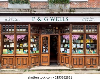 Winchester, UK - 19.04.2022. P And G Wells Old Book Store In Winchester. P G Wells Old Bookshop At College Street. Facade Of Building With Books On Display. Hampshire, England.