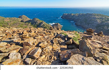 The Wind Beaten And Dry Rocky Landscape Of The Cape In Cap De Creus Peninsula, Catalonia, Spain.  This Extraordinary Landscape Inspired Some Salvador Dali Works.