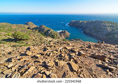 The Wind Beaten And Dry Rocky Landscape Of The Cape In Cap De Creus Peninsula, Catalonia, Spain.  This Extraordinary Landscape Inspired Some Salvador Dali Works.