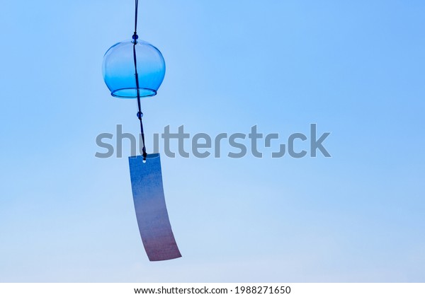 wind bell and blue\
sky