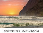 Wind blown waves on Polihale beach and the Na Pali cliff headlands, Kauai, Hawaii