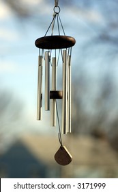 A Wind Chime Isolated Against A Natural Background