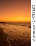 Wind energy. Dusk after sunset behind the wind energy farm on Icaraí de Amontada beach, CE, Brazil, on July 1, 2024.