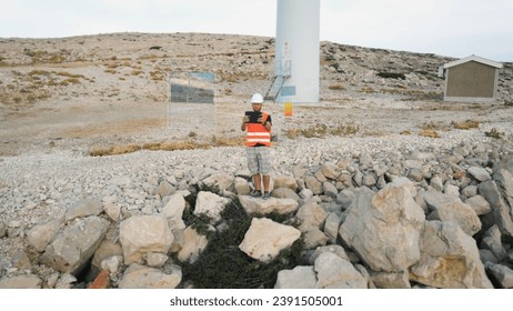 Wind energy engineer testing, controlling and supervising the function of windmill through his tablet. 3D render