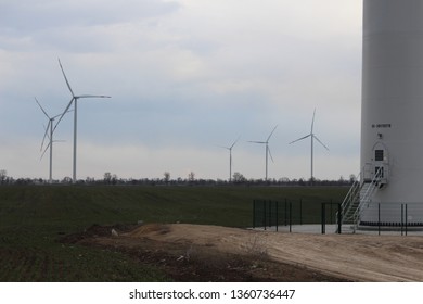 Wind Energy Windmills In A Dark Storm, Electric Generators