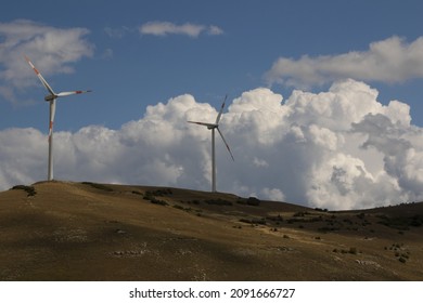 A Wind Farm, A Group Of Wind Turbines Used To Produce Electricity. It’s Sustainable, Renewable Energy For Enviromental. Italy, Europe, Russia, China, United States 