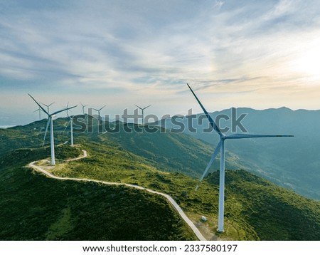 Wind farm on the mountain, blue sky and white clouds