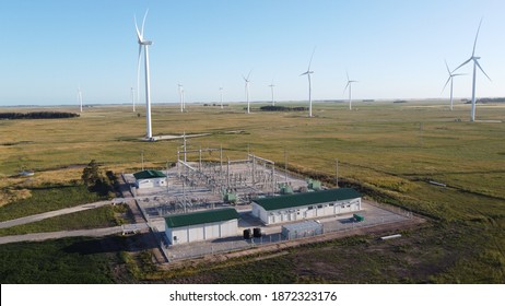 wind generators and substation with a colors sky
