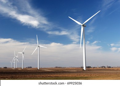 wind mill turbine in a farmland for green energy