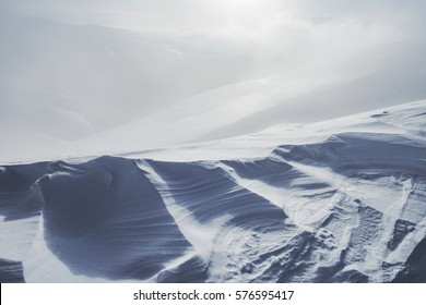 Wind on the top of a mountain - winter landscape