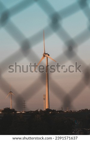 Similar – Image, Stock Photo Wind power to boost sustainability and green energy in the Ghent, Belgium. Turning wind into energy