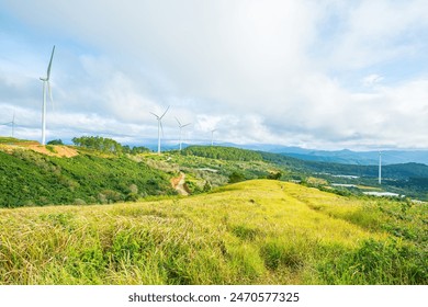 Wind power on tea hill, morning scenery on the hillside of tea planted in the misty highlands below the beautiful valley.Beautiful landscape in the morning at Cau Dat, Da Lat city, Lam Dong province. - Powered by Shutterstock