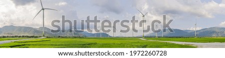 Similar – Windkraftanlage, Windgenerator mit Graffiti Malerei.