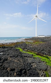 A Wind Power Plant At A Rocky Seaside