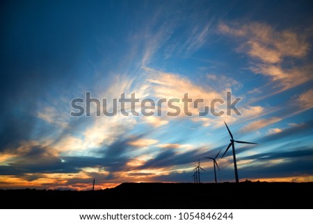 Wind power plants in sunset on Paul da Serra plain, Madeira island, Portugal