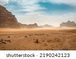 The wind raises the dust in Wadi Rum, Sahara or Arabian desert