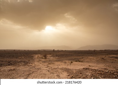Wind and skittish sky in the desert of Sahara in Morocco