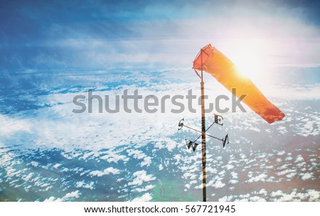 wind sock in the sky ,pastel colors style.double exposure style. weather forecast concept