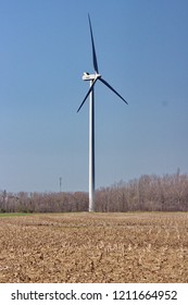 A wind turbine - Shutterstock ID 1211664952