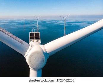 Wind turbine from aerial view, Drone view at windpark westermeerdijk a windmill farm in the lake IJsselmeer the biggest in the Netherlands,Sustainable development, renewable energy