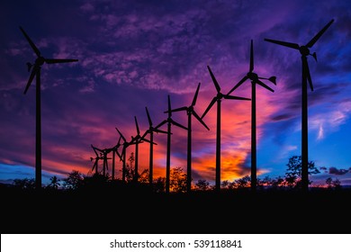 Wind Turbine for alternative energy silhouette at sunset. Eco power. - Shutterstock ID 539118841