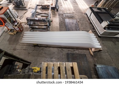 Wind Turbine Blades In The Factory Floor. View From Above. Photo Taken At An Industrial Plant In Russia